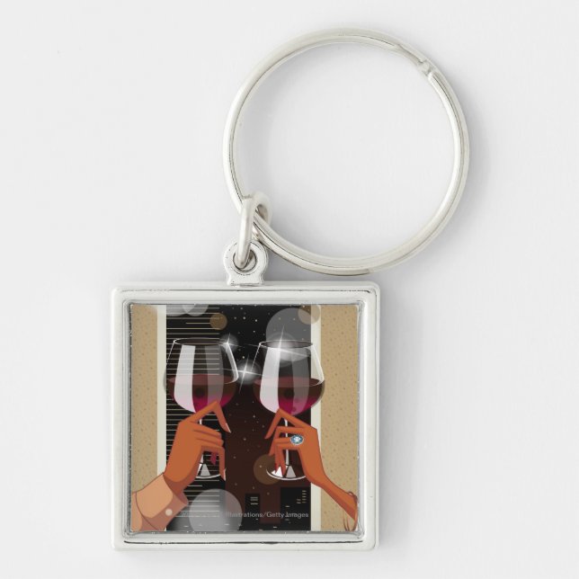 Close-up of a couple's toasting with wine glasses keychain (Front)