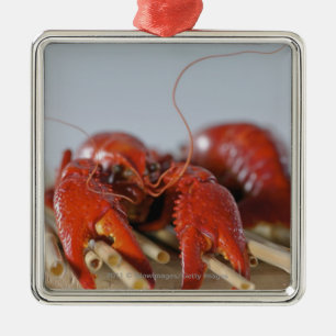 Close-up of a crab on sticks metal ornament