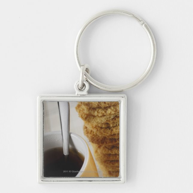 Close-up of a cup of coffee with cookies keychain (Front)