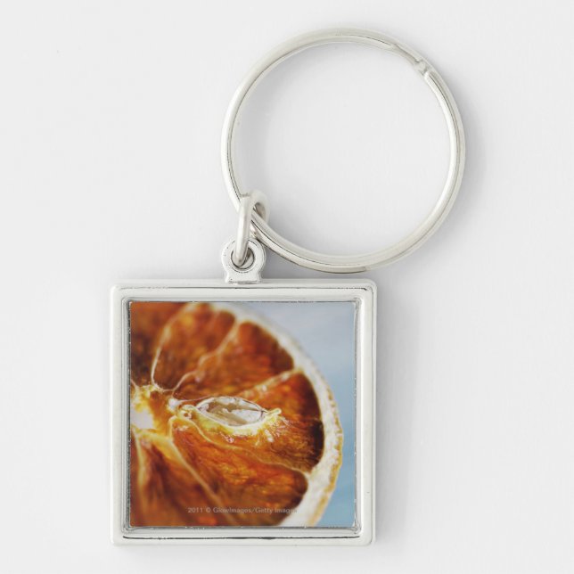 Close-up of a dried slice of lemon keychain (Front)