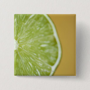 Close-up of a lemon slice pinback button