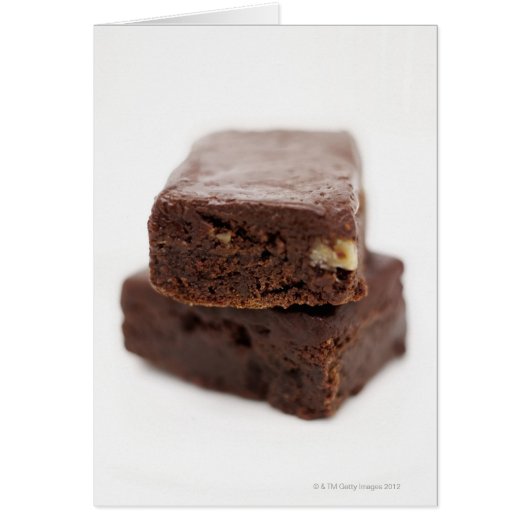 Close-up of a pile of two chocolate brownies on (Front)