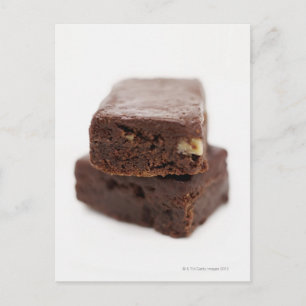 Close-up of a pile of two chocolate brownies on postcard