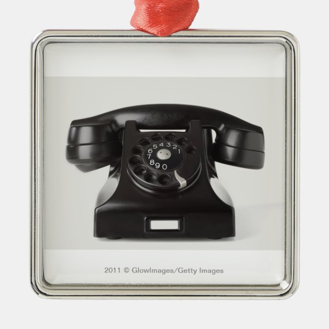 Close-up of a rotary phone metal ornament (Front)
