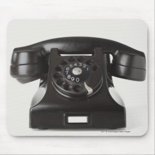 Close-up of a rotary phone mouse pad