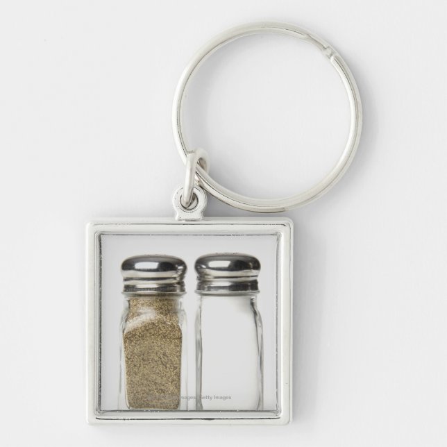 Close-up of a salt and a pepper shaker keychain (Front)