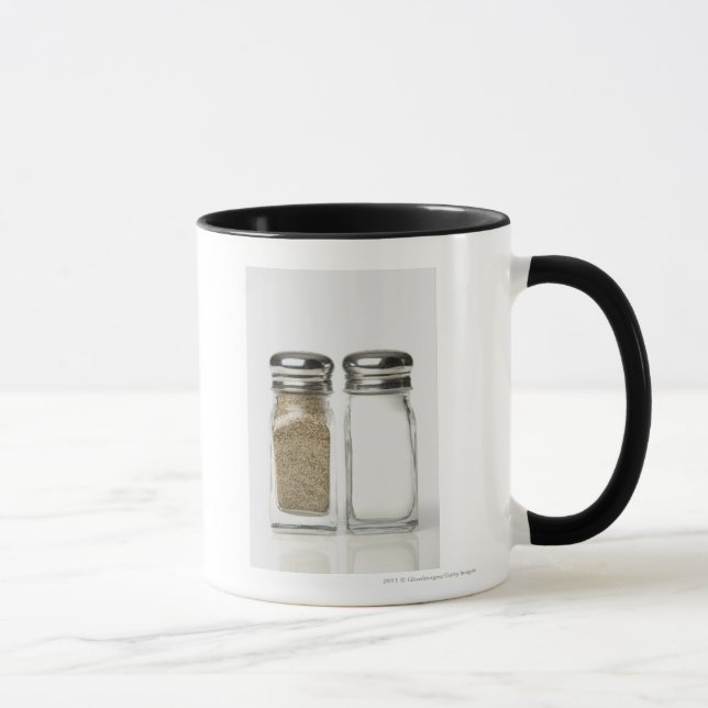 Close-up of a salt and a pepper shaker mug (Right)