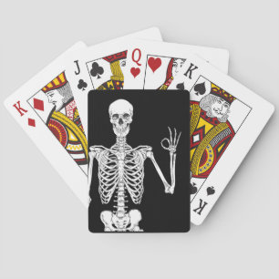 Close-Up of a Skeleton's Okay Gesture Poker Cards