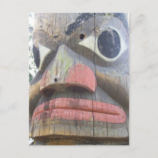 Close up of a totem pole postcard
