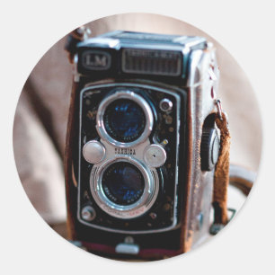 Close-up of an antique camera classic round sticker