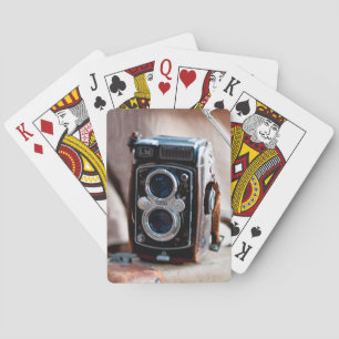 Close-up of an antique camera poker cards