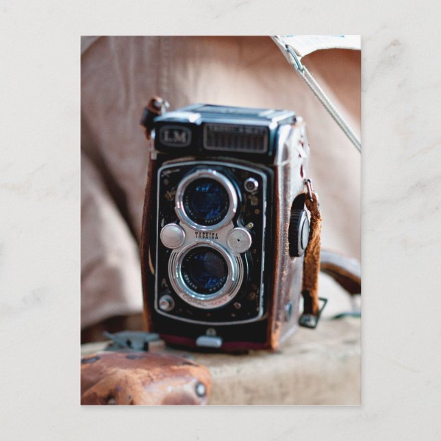 Close-up of an antique camera postcard (Front)