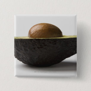 Close-up of an avocado pinback button