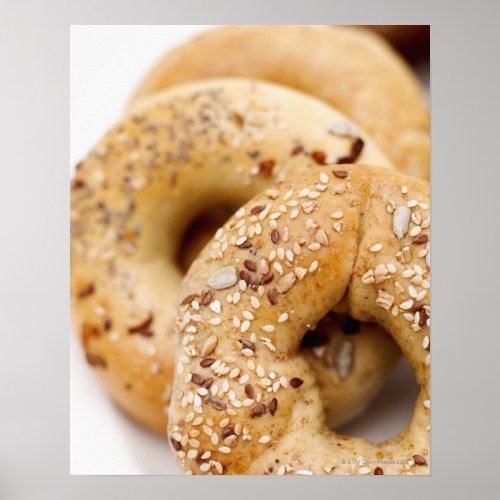Close_up of assorted bagels on a plate poster