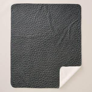 Close up of black leather texture and backgroundle sherpa blanket