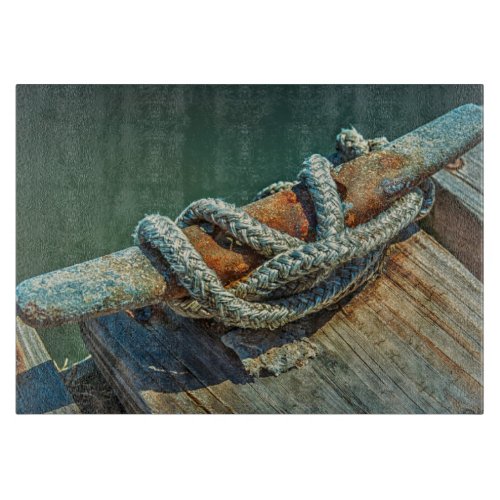 Close_up of boat cleat and rope cutting board