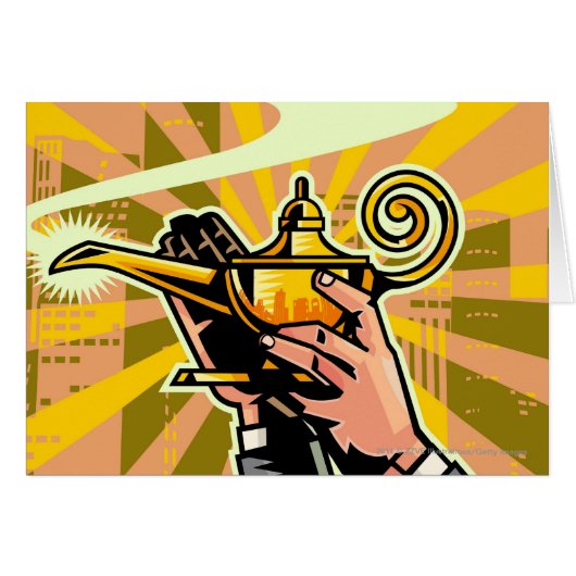 Close-up of businessman holding magic lamp cards (Front Horizontal)