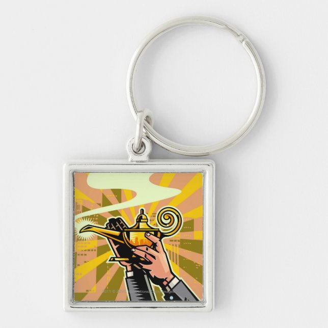 Close-up of businessman holding magic lamp keychain (Front)
