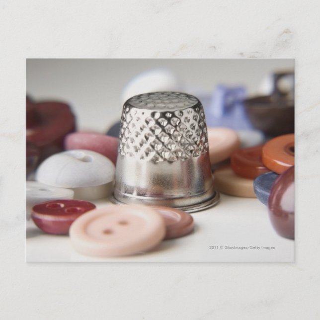 Close-up of buttons with a metal cap postcard (Front)