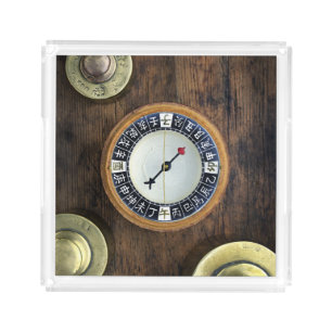 Close Up Of Chinese Compass And Gold Weights Acrylic Tray