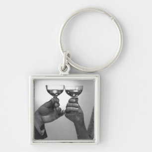 Close up of couple toasting with white wine B&W Keychain
