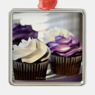 Close-up of cupcakes with selective focus on metal ornament