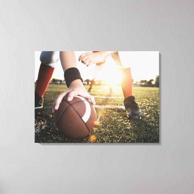 Close up of football center preparing to snap canvas print (Front)