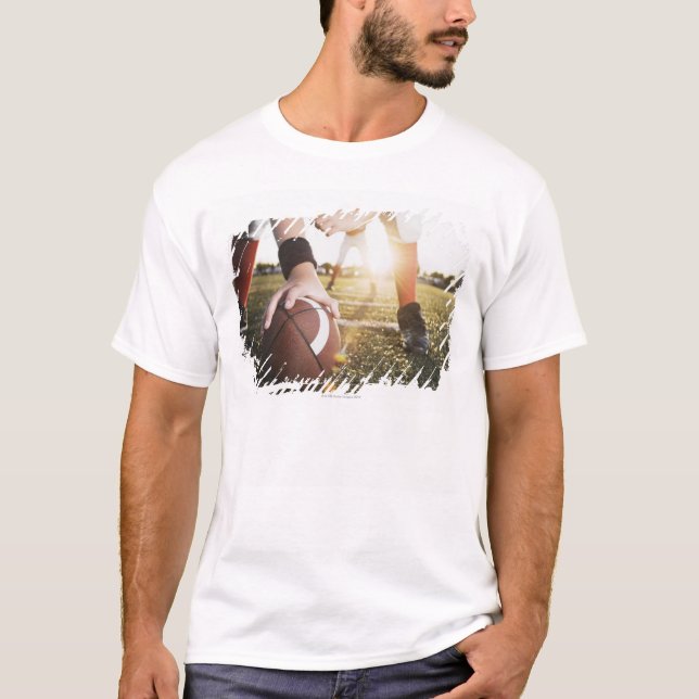 Close up of football center preparing to snap T-Shirt (Front)