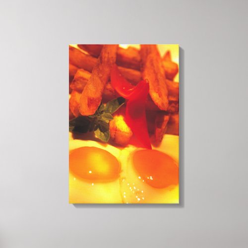 close_up of fried eggs with french fries canvas print