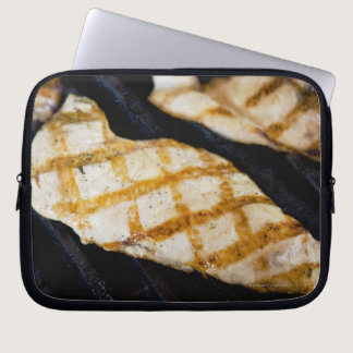 Close-up of grilled chicken breasts laptop sleeve