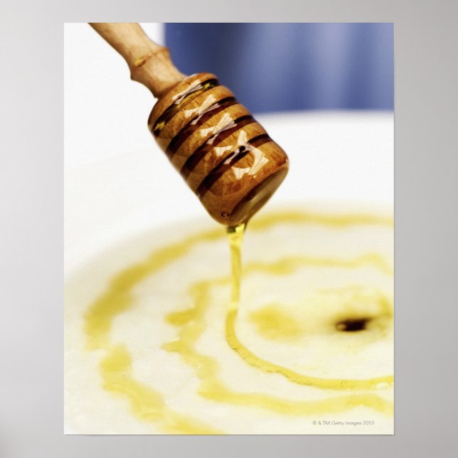 Close-up of honey dribbling on a dessert poster (Front)
