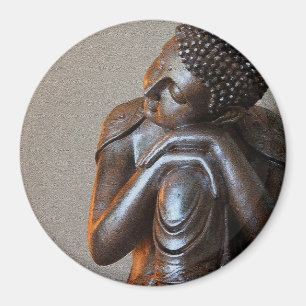 Close up of peaceful silver Buddha Magnet