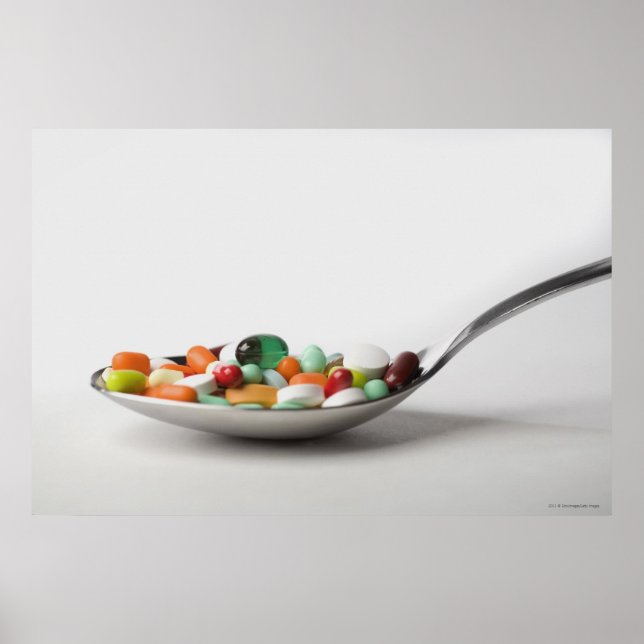 Close-up of pills in a spoon poster (Front)