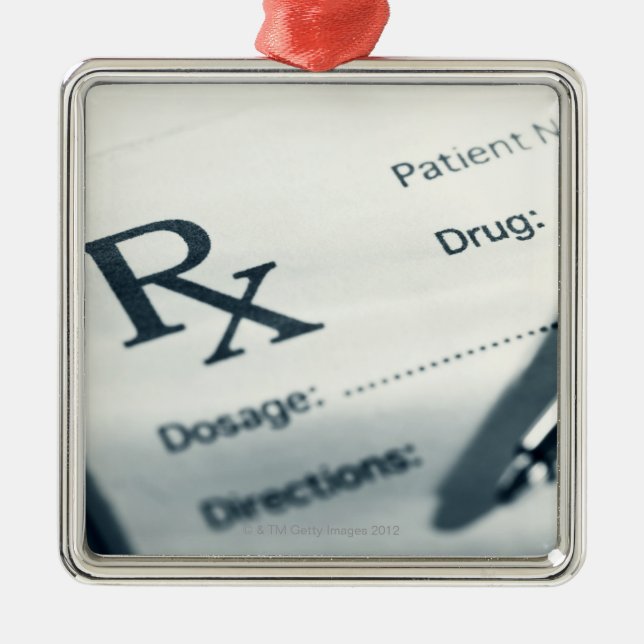 Close up of prescription pad and pen metal ornament (Front)