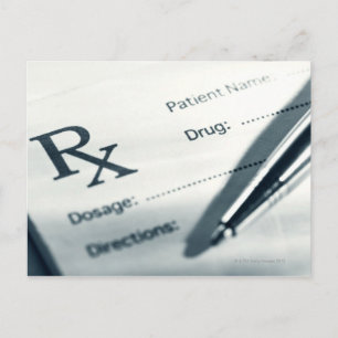 Close up of prescription pad and pen postcard