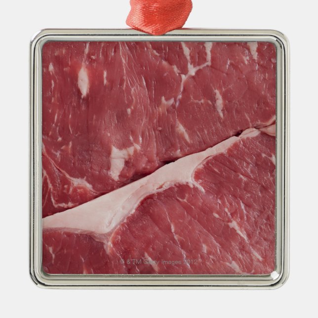 Close-up of raw steak metal ornament (Front)