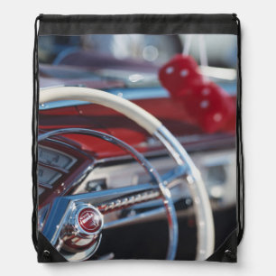 Close-up of steering wheel in classic car drawstring bag