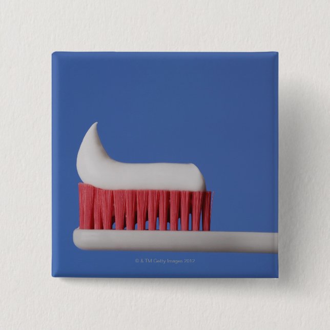 Close-up of toothpaste on a toothbrush button (Front)