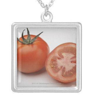 Close-up of two tomatoes silver plated necklace