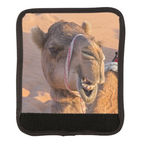 Close_up on funny camel head in Oman Wahiba desert Luggage Handle Wrap