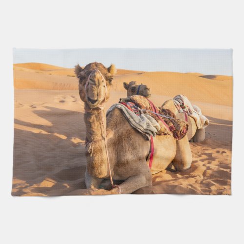 Close_up on funny camel in Oman Wahiba desert Kitchen Towel