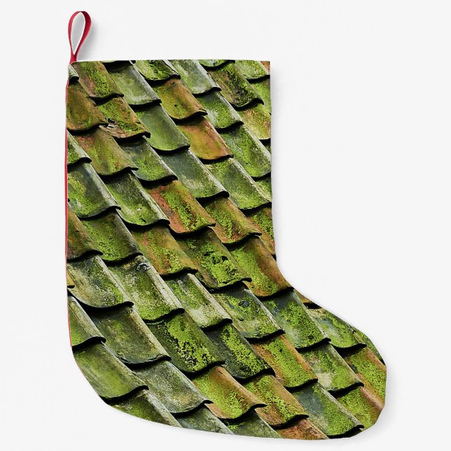 Close-up photo of green shingle roof small christmas stocking (Front)