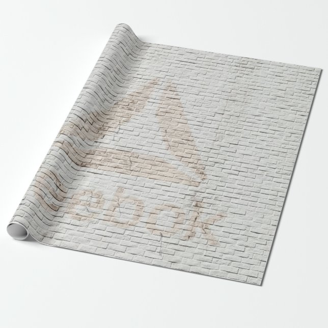 Close-up photo of Reebok logo on wall Wrapping Paper (Unrolled)