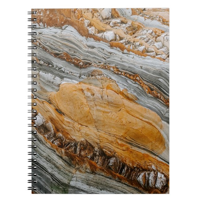 Close-up photography of gray and orange stones notebook (Front)