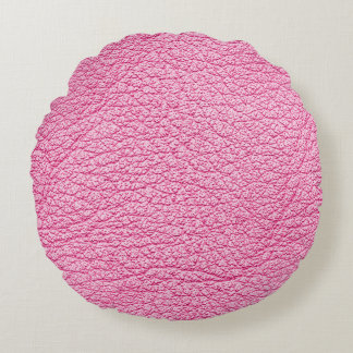 Close-up pink leather, textured background. round pillow