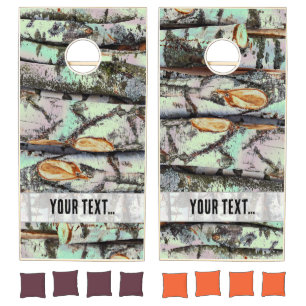 Close-up scene of birch log stumps, rustic charm cornhole set