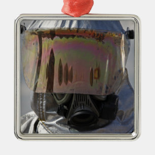 Close-up view of a firefighter metal ornament