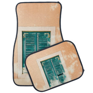 Closed green wooden door car floor mat