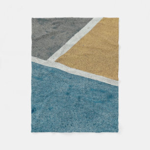 Closeup gray, yellow, and blue painted pavement fleece blanket