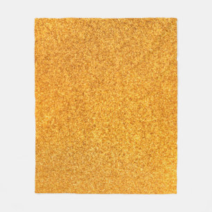 Closeup of golden matte metal texture. Shiny metal Fleece Blanket